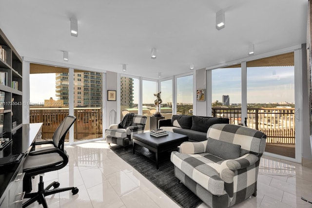 tiled living room with a wall of windows