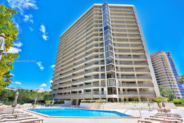 view of swimming pool with a patio area