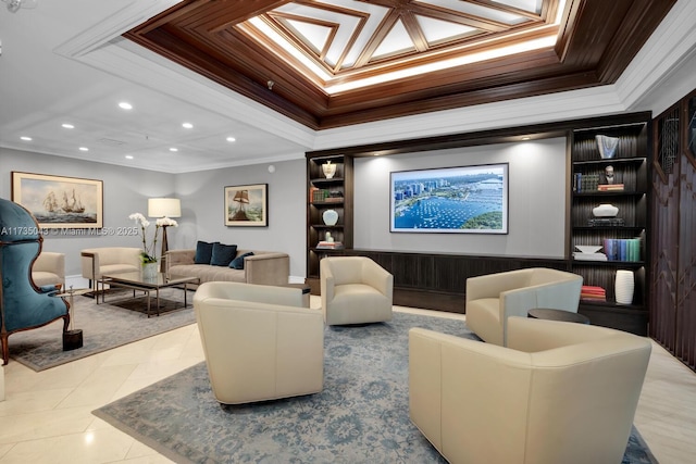 home theater featuring a tray ceiling, built in features, ornamental molding, and light tile patterned flooring