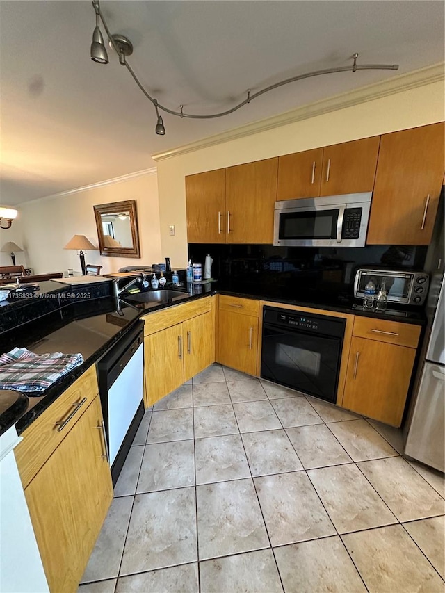 kitchen featuring sink, white dishwasher, ornamental molding, light tile patterned flooring, and oven