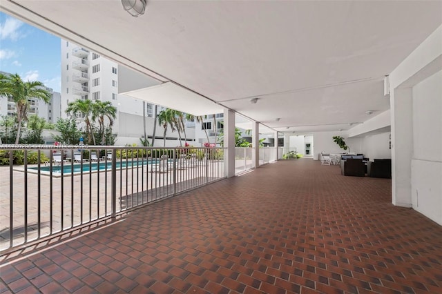 1666 W Ave Unit 207, Miami Beach, FL 33139 - view of patio with a community pool