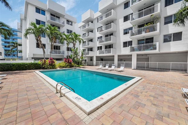1666 W Ave Unit 207, Miami Beach, FL 33139 - community pool featuring a patio