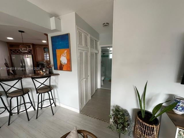 hallway featuring light hardwood / wood-style floors