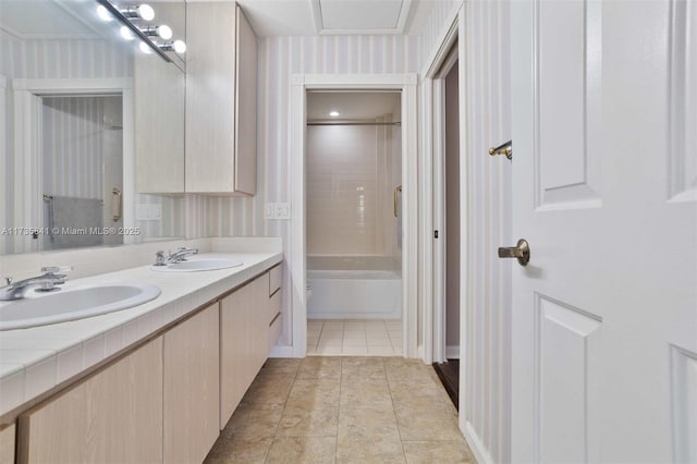 bathroom featuring vanity,  shower combination, and tile patterned floors