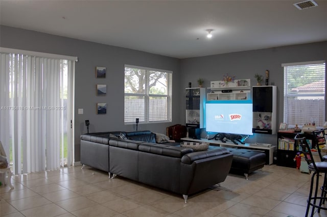 living room with light tile patterned floors