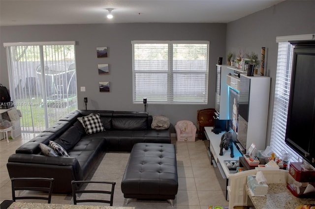 living room with light tile patterned flooring