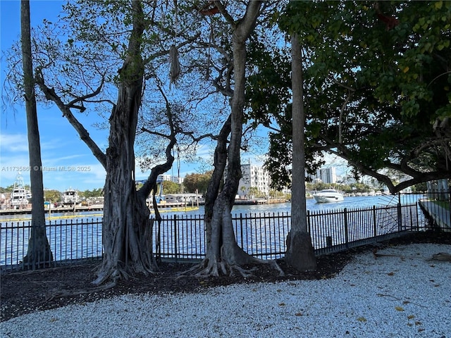 exterior space with a water view