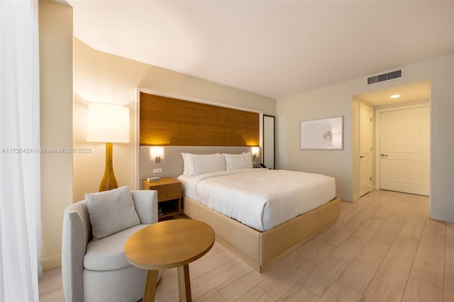 bedroom featuring light hardwood / wood-style flooring