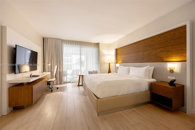 bedroom featuring light hardwood / wood-style flooring