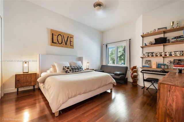 bedroom featuring dark wood-type flooring