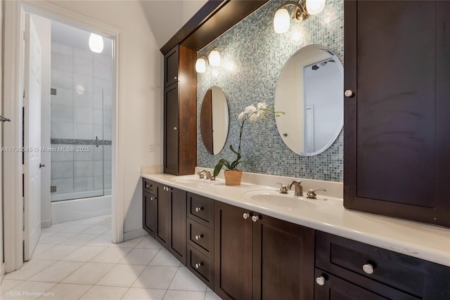 bathroom featuring vanity, tile patterned floors, and shower / bath combination with glass door