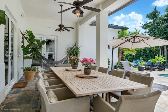 view of patio / terrace with ceiling fan