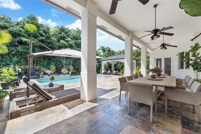 view of patio / terrace with ceiling fan