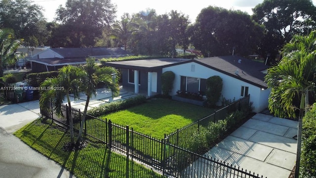 ranch-style house with a front yard