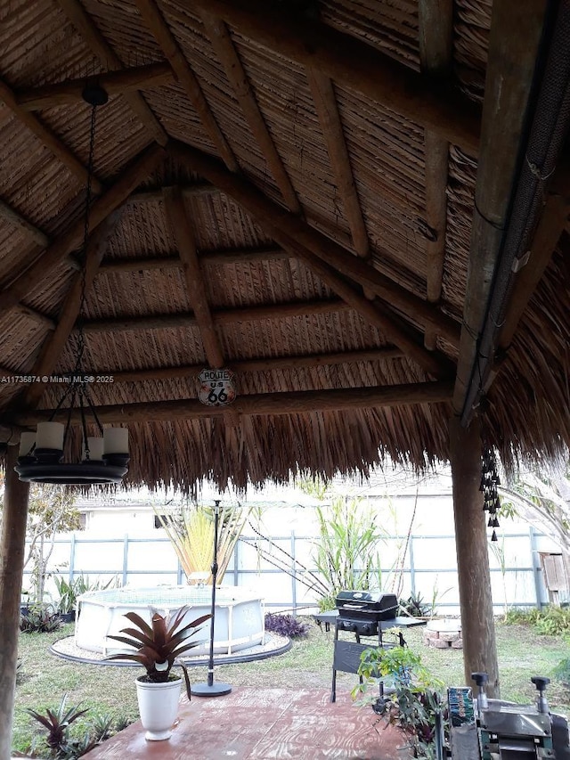 view of home's community with a pool, a gazebo, and a patio area