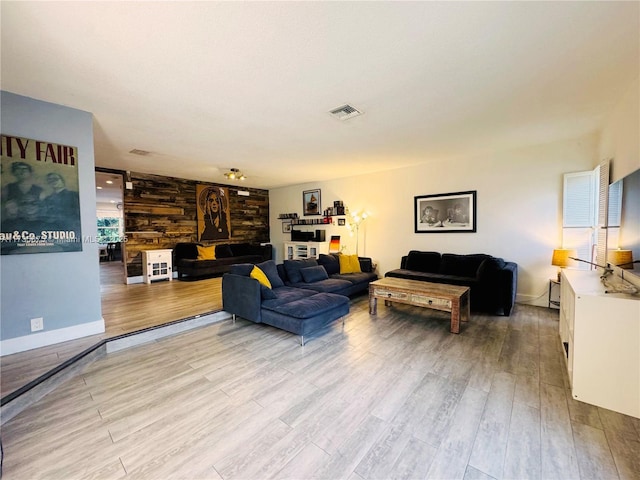 living room with light hardwood / wood-style floors