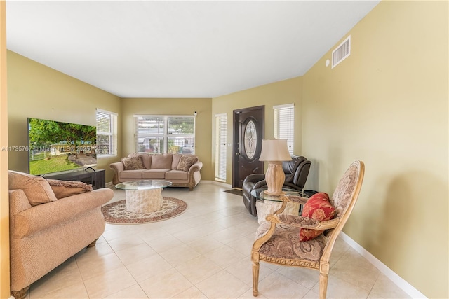 living room featuring light tile patterned floors