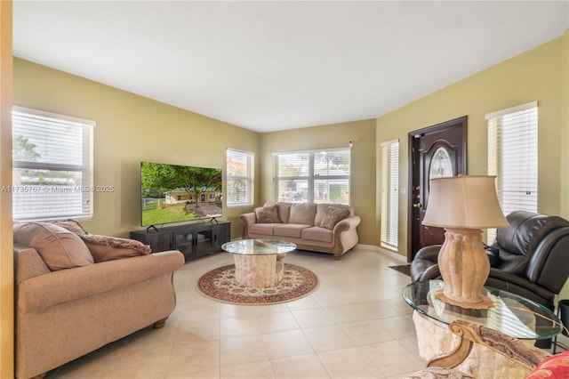 living room with light tile patterned floors