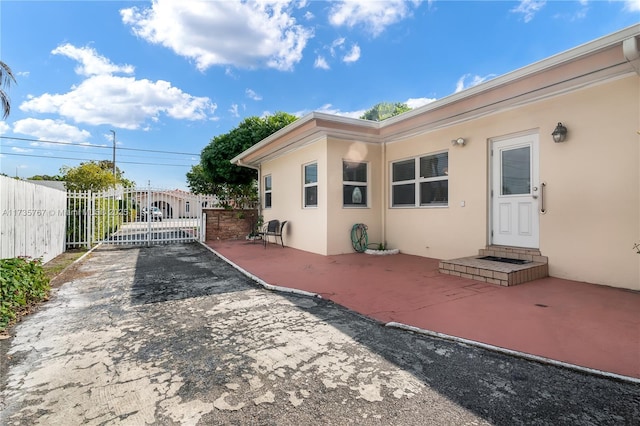 rear view of property with a patio area