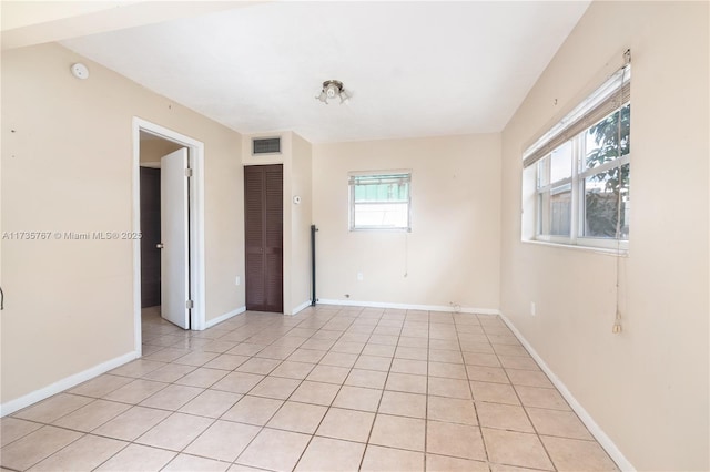 view of tiled spare room