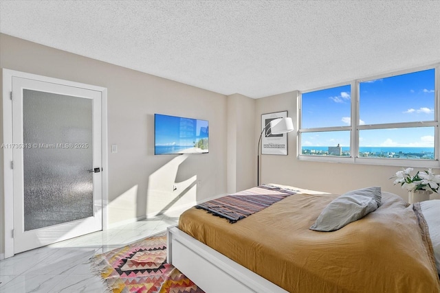 bedroom with a textured ceiling