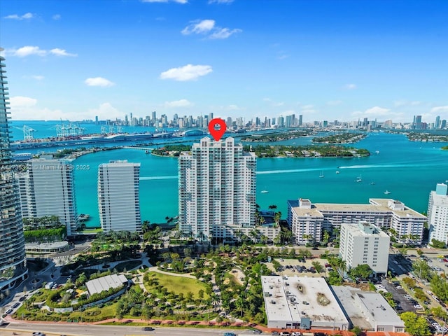 birds eye view of property featuring a water view