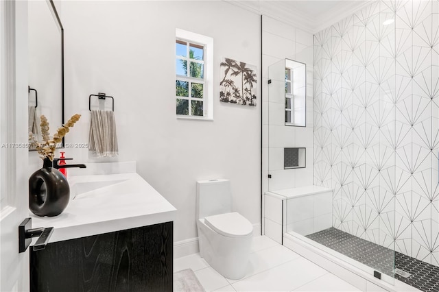 bathroom featuring tiled shower, toilet, crown molding, vanity, and tile patterned flooring