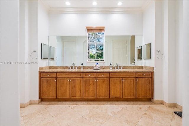 bathroom with vanity, tile patterned floors, and ornamental molding