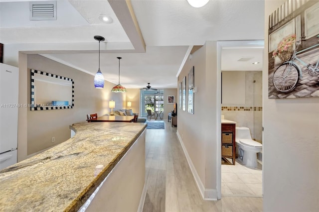 700 SE 6th Ave Unit 203, Deerfield Beach, FL 33441 - interior space featuring baseboards, visible vents, and light wood-style floors