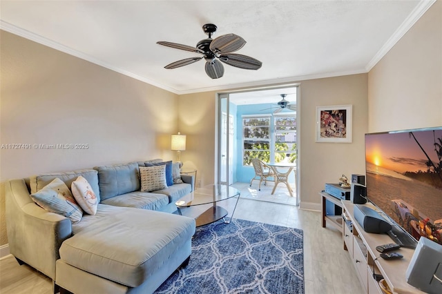 700 SE 6th Ave Unit 203, Deerfield Beach, FL 33441 - living room with ceiling fan, light wood finished floors, baseboards, and crown molding