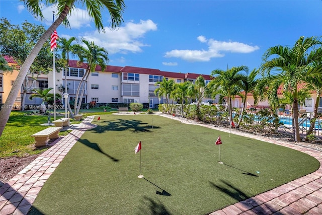 700 SE 6th Ave Unit 203, Deerfield Beach, FL 33441 - view of property's community with a residential view and a swimming pool