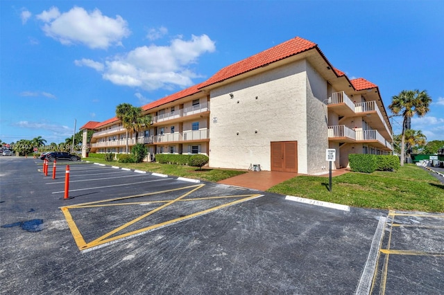 700 SE 6th Ave Unit 203, Deerfield Beach, FL 33441 - exterior space featuring uncovered parking