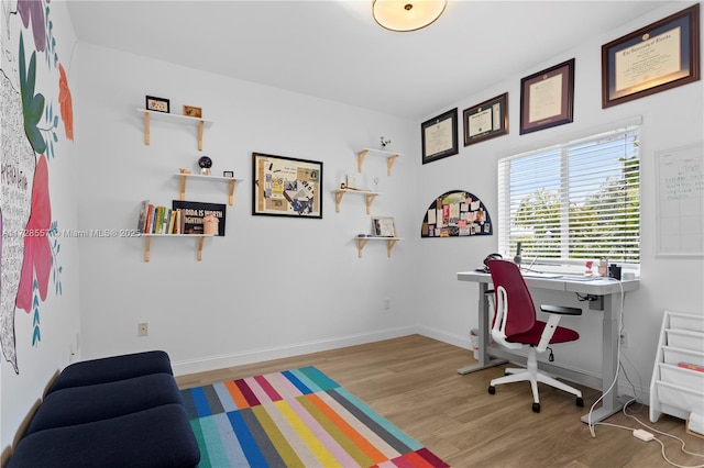 office area featuring light wood-type flooring