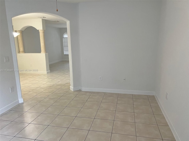 view of tiled spare room