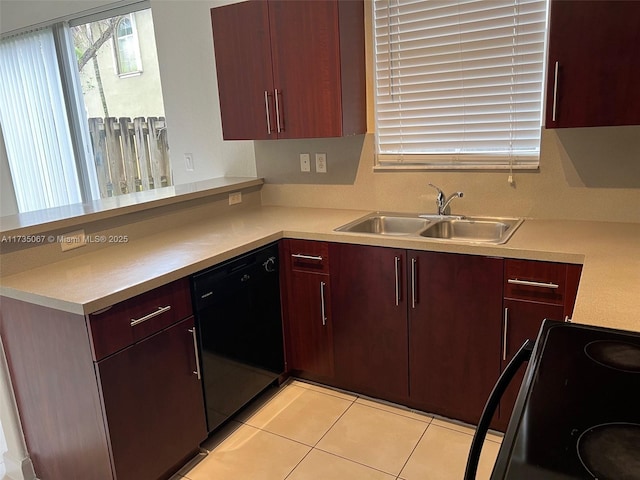 kitchen featuring sink, light tile patterned floors, dishwasher, kitchen peninsula, and stove