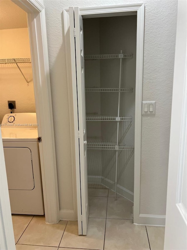 pantry featuring washer / dryer