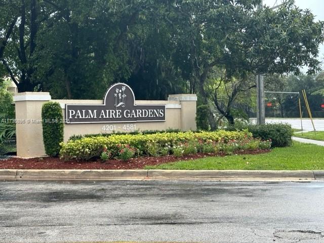 view of community sign