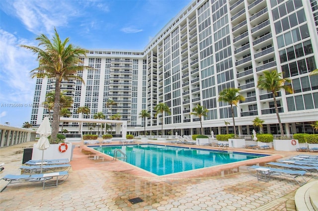 view of swimming pool with a patio area