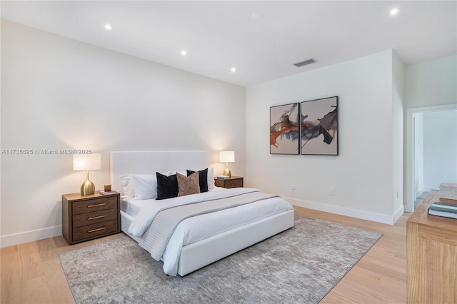 bedroom featuring light wood-type flooring