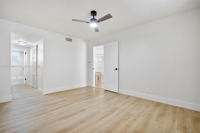 4050 NW 42nd Ave Unit 318, Fort Lauderdale, FL 33319 - unfurnished room featuring ceiling fan, a textured ceiling, and light hardwood / wood-style floors