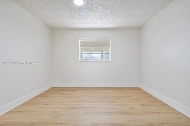 4050 NW 42nd Ave Unit 318, Fort Lauderdale, FL 33319 - spare room with a textured ceiling and light hardwood / wood-style floors