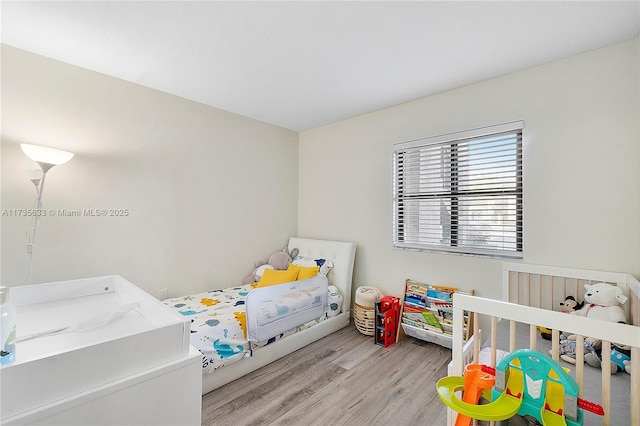 bedroom featuring light hardwood / wood-style floors