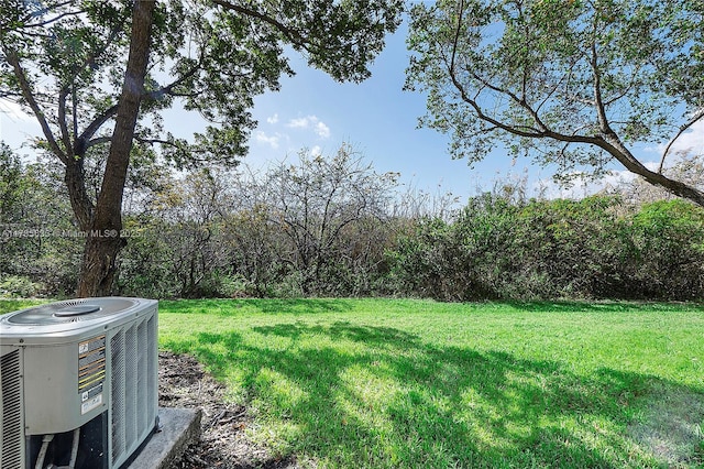 view of yard with central AC