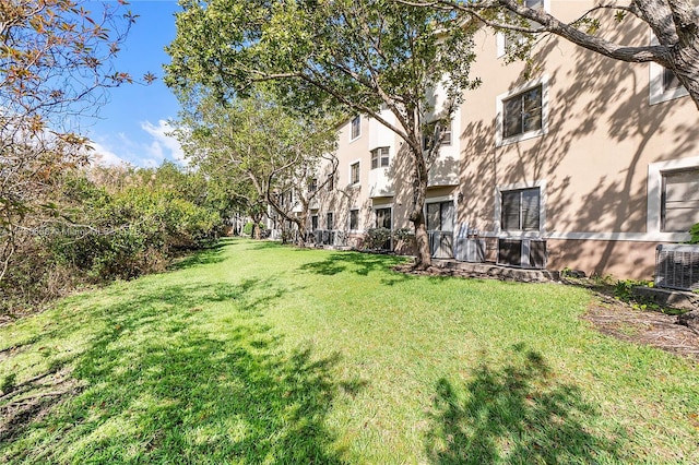 view of yard featuring central AC