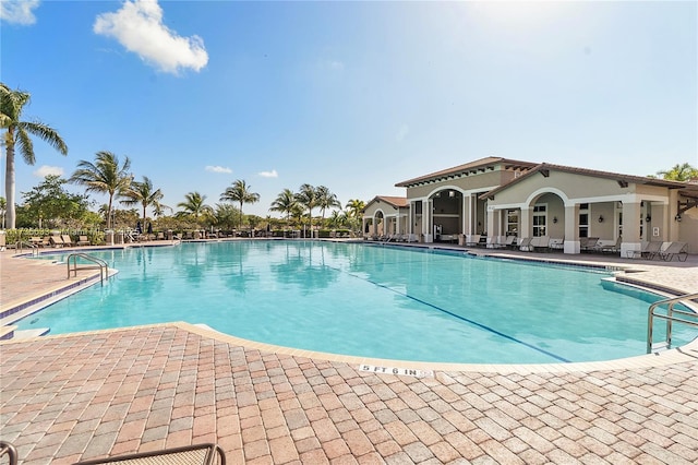 view of pool featuring a patio area