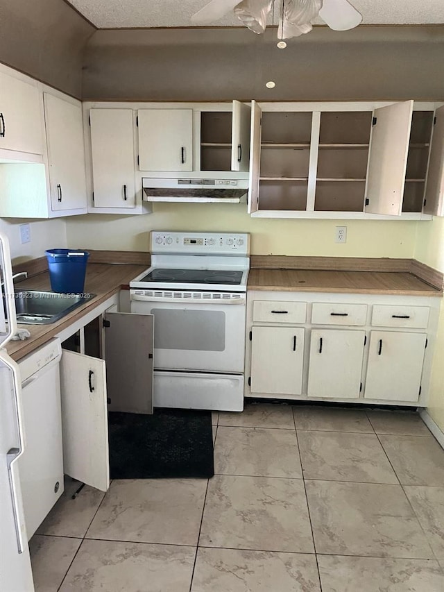 kitchen with ceiling fan, sink, white cabinets, and white appliances