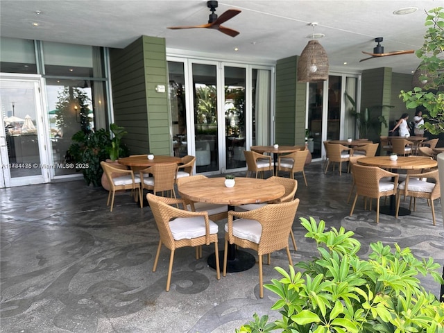 view of patio featuring ceiling fan