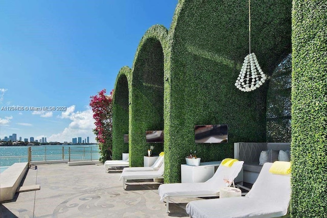 view of patio / terrace with a water view