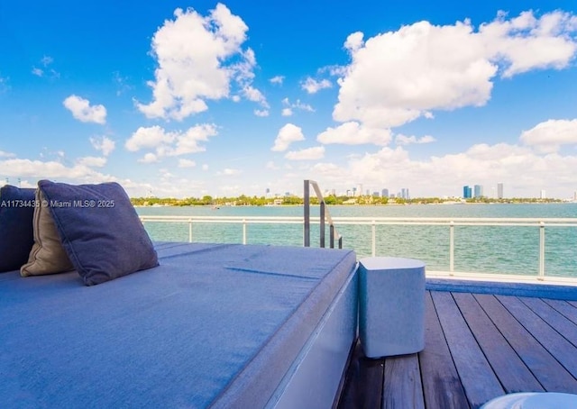 deck featuring a water view