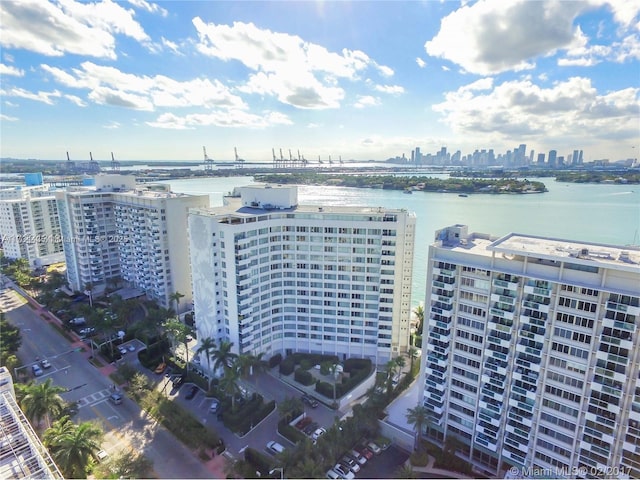 birds eye view of property featuring a water view